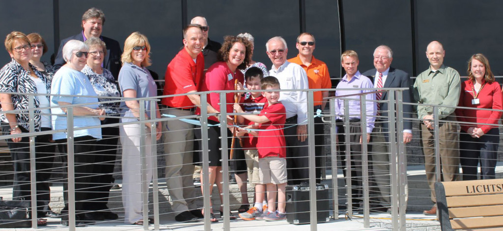 Ron and Hope along with their boys Ryland, left and Gavin cut the ribbon on the new facility on opening day in 2014.